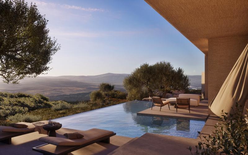 Terrasse mit Infinity-Pool und Bergblick im Golfresort oberhalb von Paphos